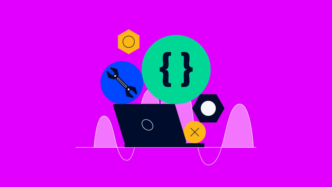 wrenches and bolts and parentheses next to a laptop for technical program manager