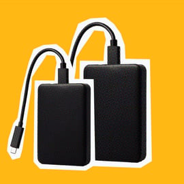 image of two hard drives on an orange background for digital asset management workflow
