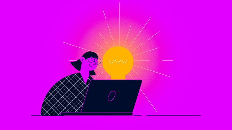 project manager with a lightbulb over their computer for design thinking in project management