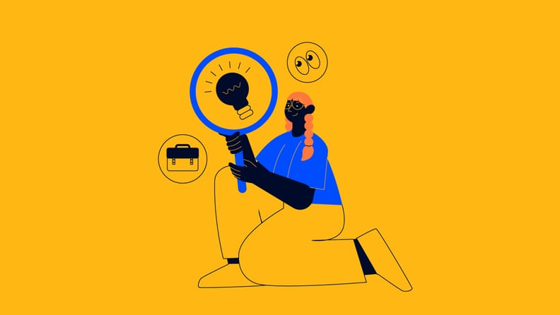 project manager holding up a magnifying glass for how to get started in project management