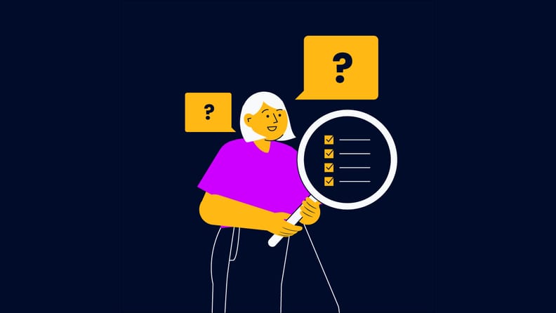 project manager holding a magnifying glass for project assumptions