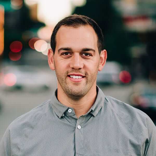 photo of Ben Aston on a blurry background