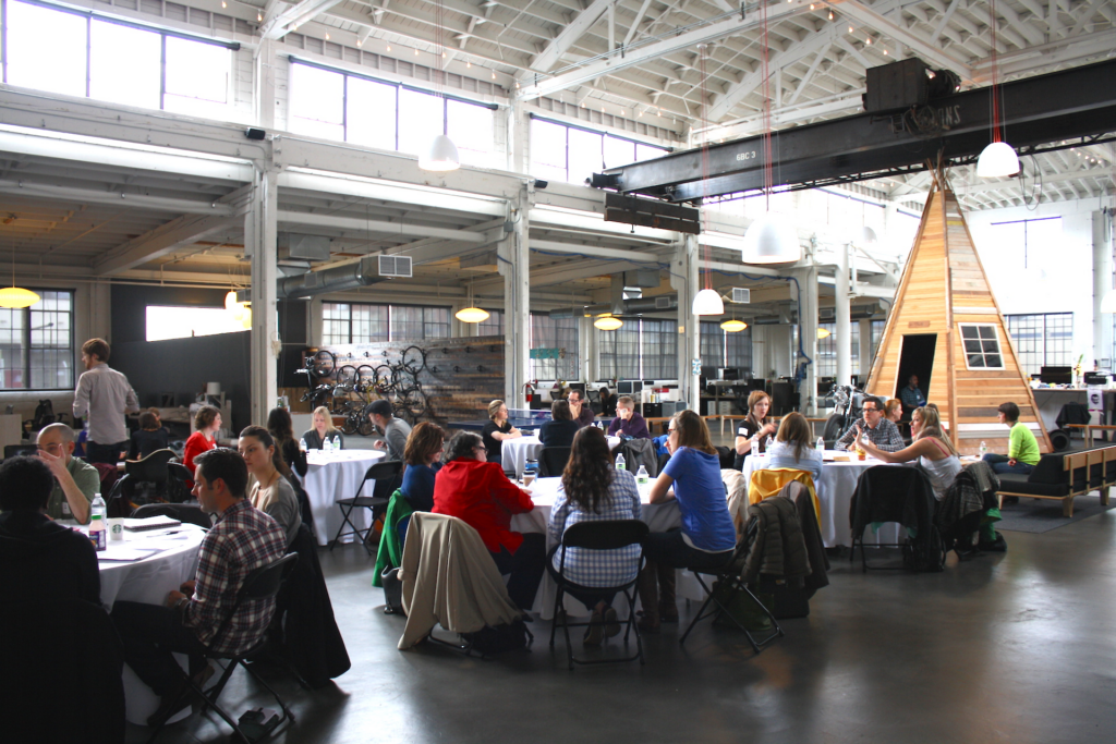 Attendees networking at AI & Your Agency