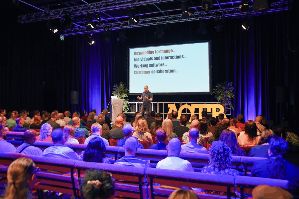 Speaker presenting at the Agile on the Beach conference