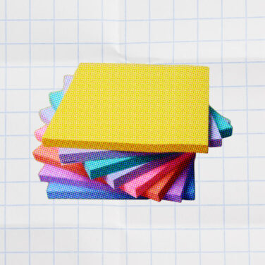 stack of sticky notes on a white background for task management skills
